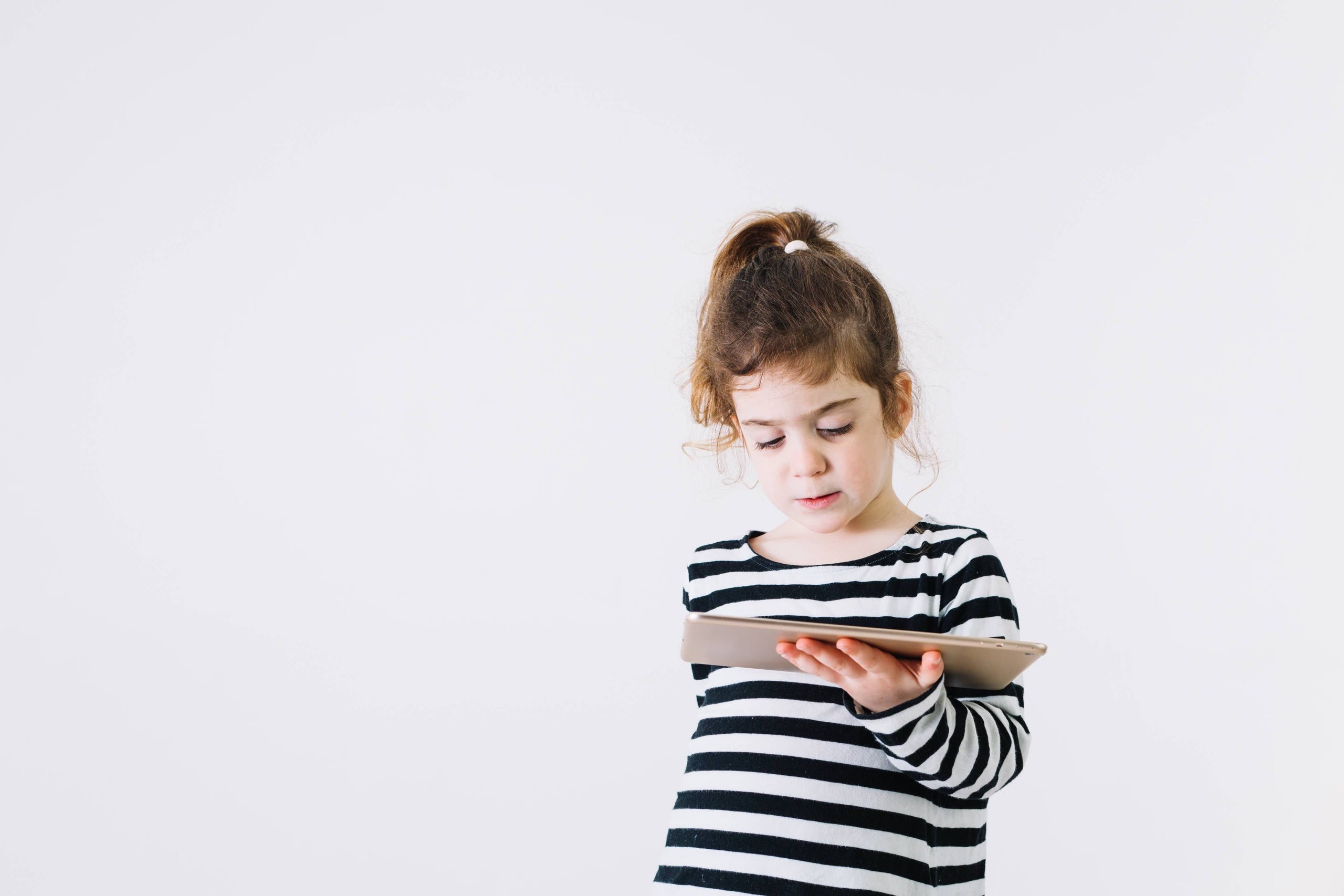 Kid reading tablet